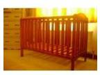 baby cot. This is a wooden cot very strong. Only fault....